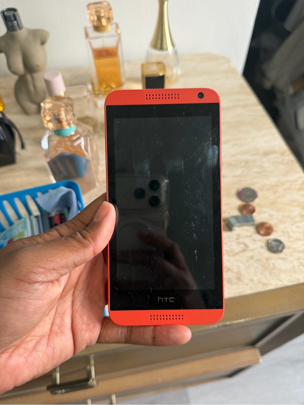 HTC Red and Black Front-Facing Smartphone